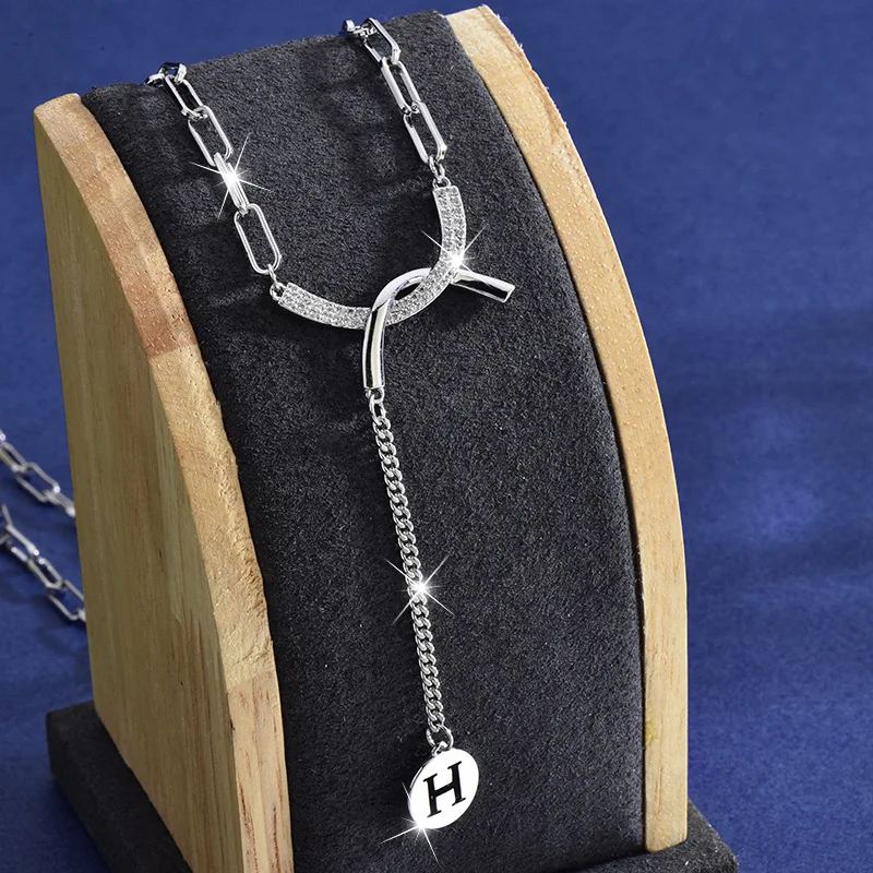 

Titanium steel double C necklace, versatile autumn and winter sweater chain, women's fringed letter collarbone necklace