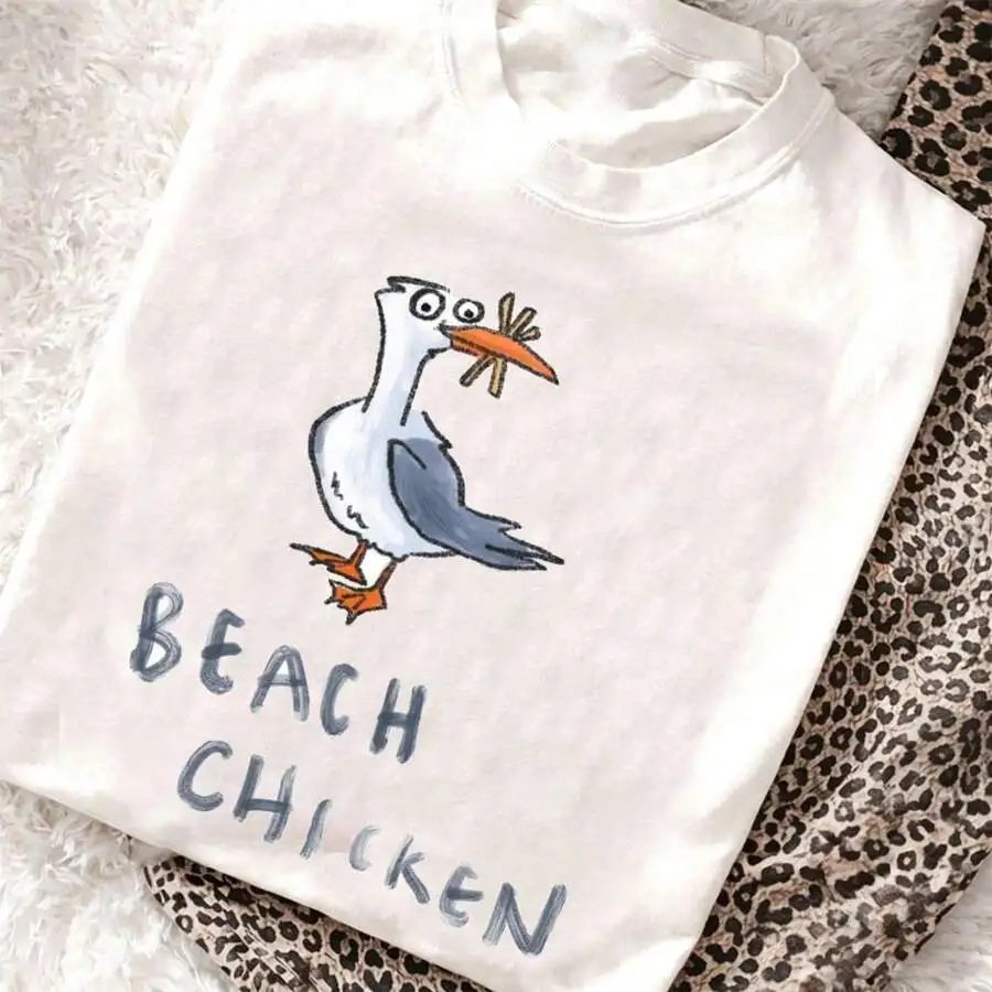New Fashion Quirky Coastal Humor Print T-Shirt Apparel, Funny Beach Seagull And Chicken Doodle Graphic Drop Shoulder Round Neck Casual Short Sleeve Tee