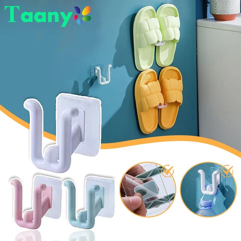 Estante de zapatillas autoadhesivo para baño, estante de drenaje de inodoro Simple, gancho de almacenamiento de dormitorio montado en la pared,