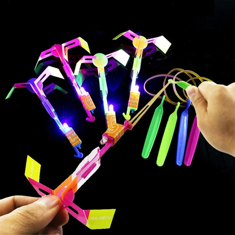 Funny outdoor sport LED Light Arrow Rocket Helicopter Slingshot aircraft Flying Toys Rubber Band Catapult Bamboo Dragonfly gift