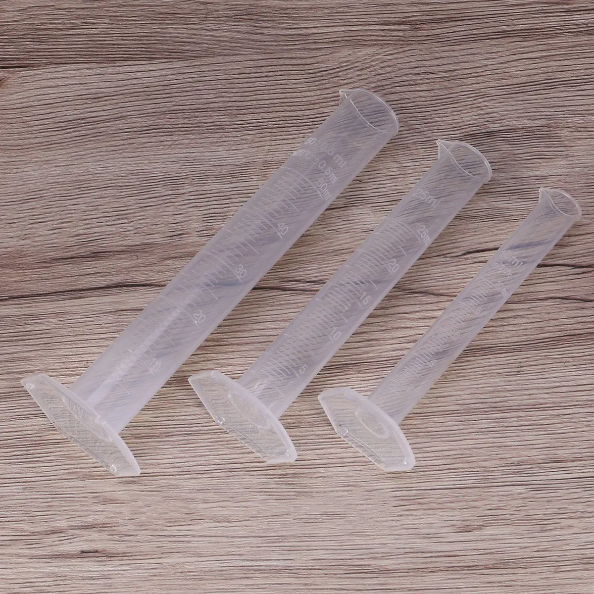 

Набор из 5 пластиковых градуированных мерных цилиндров (10 мл, 25 мл, 50 мл, 100 мл, 250 мл) с широким основанием, устойчивые к скручиванию, легко использовать