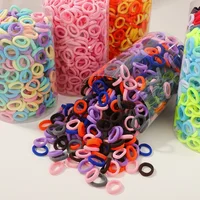 50/100/300 Uds Mini bandas elásticas coloridas para el cabello para niñas accesorios para el cabello diadema de nailon soporte para cola de caballo para niños adorno Scrunchie