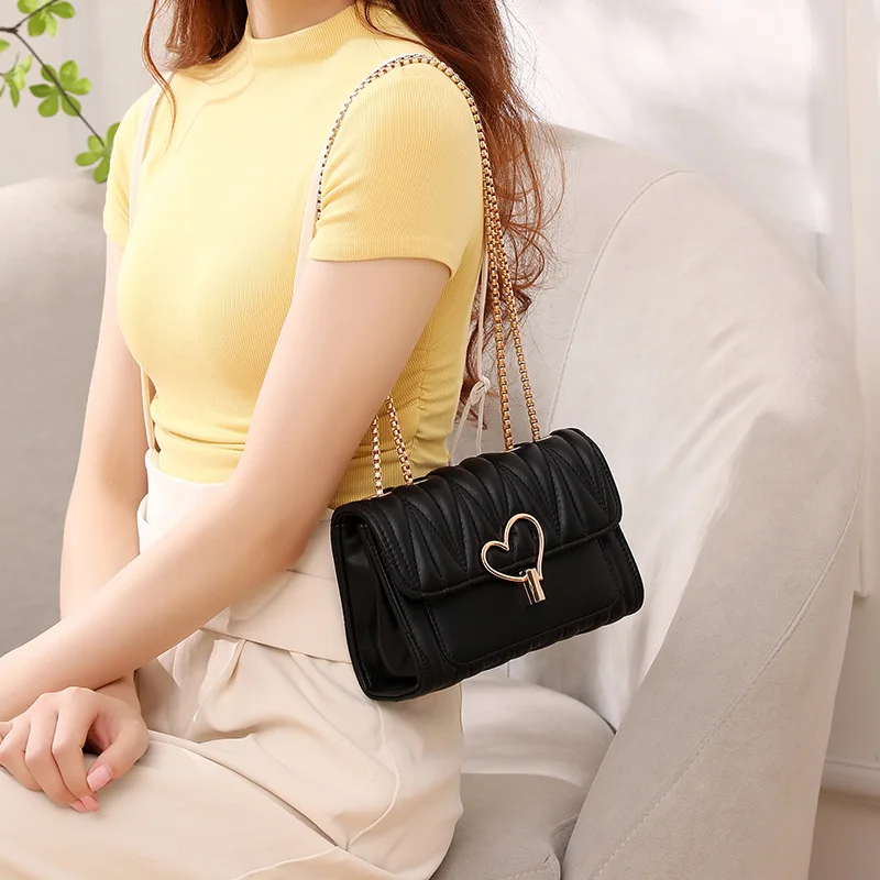 Love lock small bag 2024 trendy fashion Joker solid color rhombic embroidered slung high quality shoulder bag.