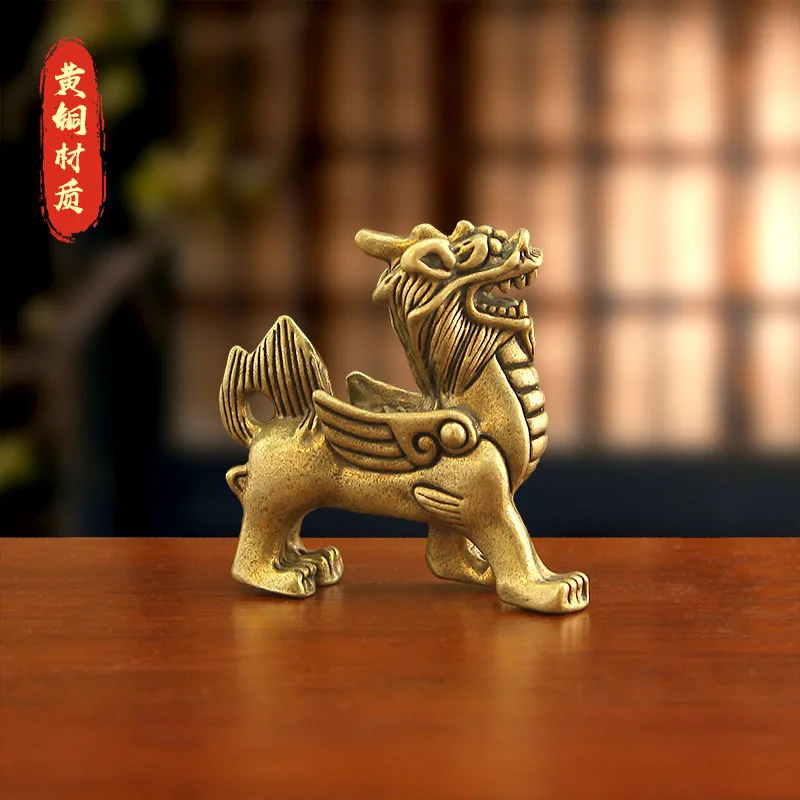 Retro brass Chinese-style flying qilin desktop ornament, a metal craft designed to attract wealth, perfect as a housewarming or