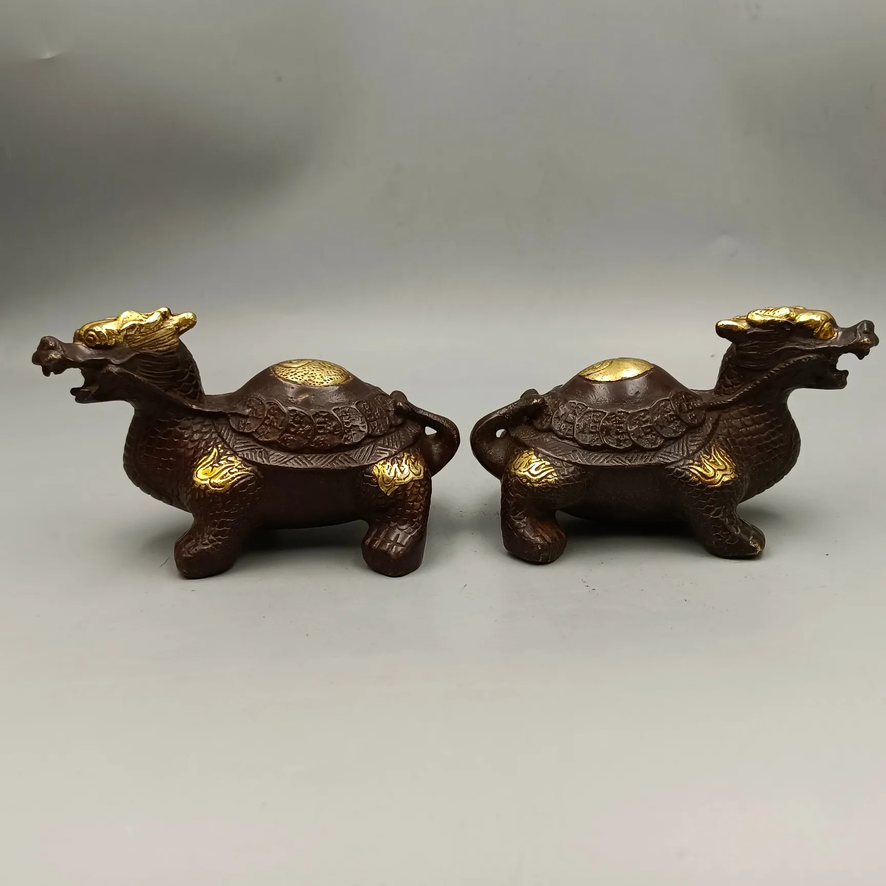 

A Pair of Finely Crafted Home Crafts Featuring Red Copper Gilded Bagua With Money And Dragon Turtle Ornaments