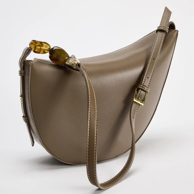 

2025 Fashion Classics Design Women Irregular Underarm Bag Casual PU Leather Handbags Asymmetric Shoulder Bag with Stone Chain