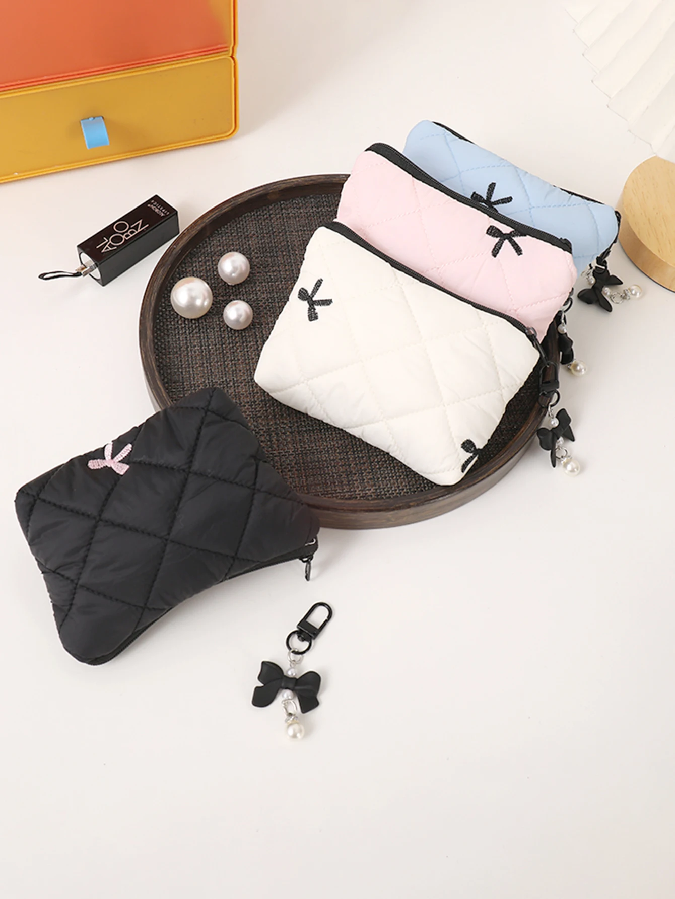 Gesteppte Schleifen-Make-up-Tasche, tragbare Reisetasche für Lippenstift, Kopfhörer und Kleinteile, exquisite Handtasche – Detail 7