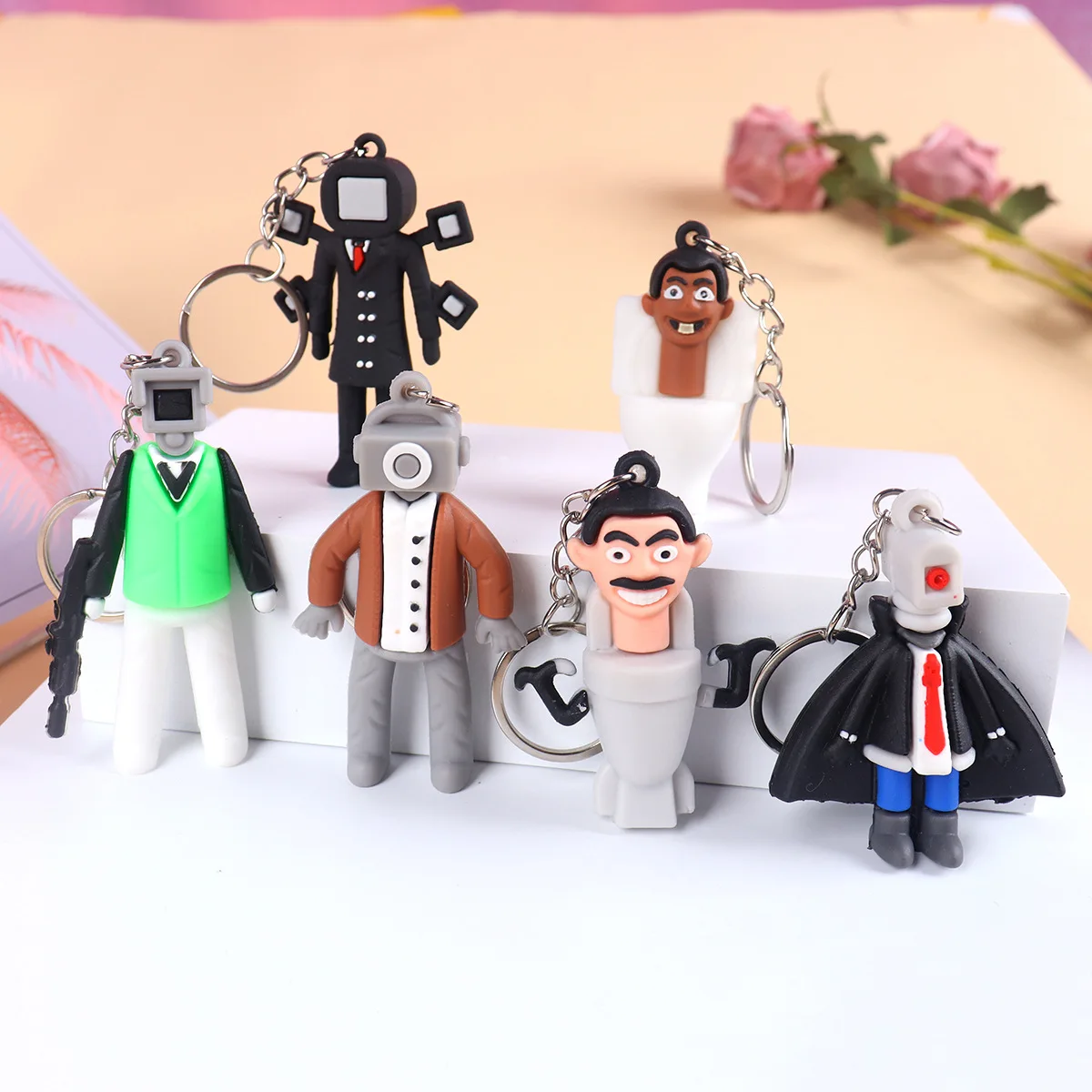 

PVC Skibidi Toilet Keychain Toilet Monitor Man Radio Man Game Action Figure Bag Pandent Christmas Gifts Children Toys