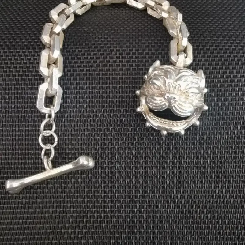 

Chinese Miao Silver Hand Carved Dog Head Statue Bracelet Gift Collection