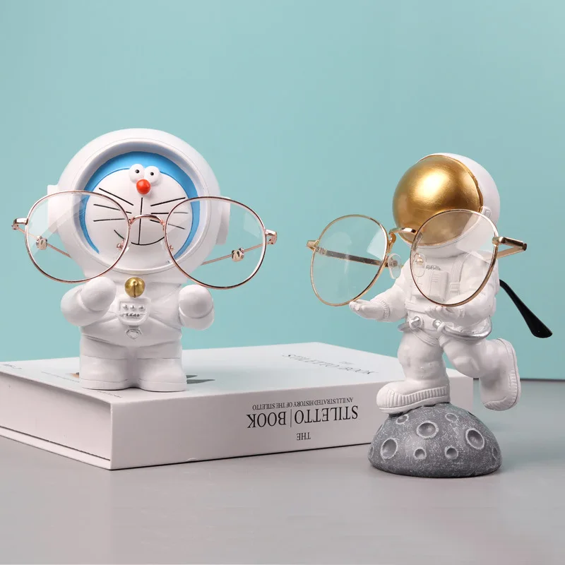 Creativo Doraemon Macchina Gatto Astronauta Porta occhiali Negozio di occhiali Espositore Ornamenti Anime Periferico Giocattolo per bambini Regalo