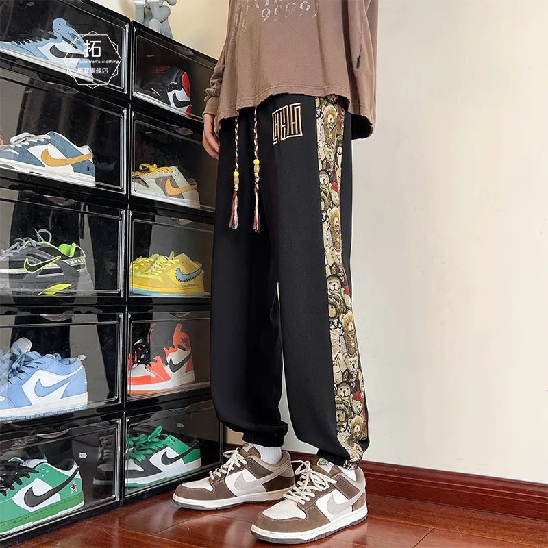 

Новые китайские мужские повседневные брюки свободного кроя с вышивкой медведя, осенне-весенние, модные, с пэчворком и манжетами, длинные