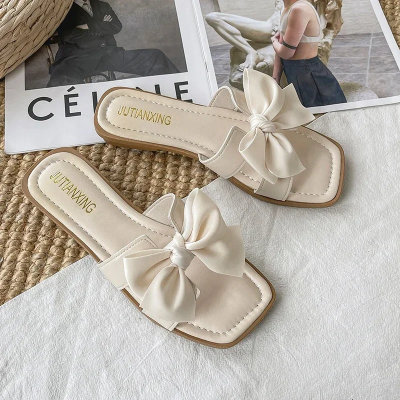 Summer Large Size Slippers for Women Flat 2023 New Solid Color High-end Fairy Style Women's Bow Sandals for Going Out PU