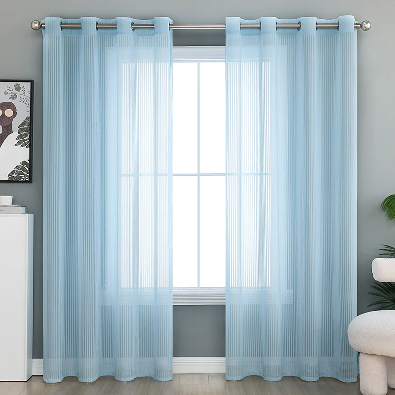The Curtains in The Living Room and Bedroom Are Striped and Allow Light To Pass Through But Do Not Let People Pass Through.