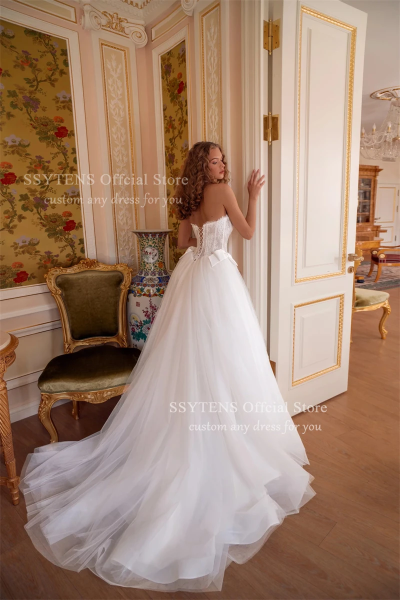 فساتين زفاف SSYTENS المصنوعة من الدانتيل بدون حمالات، مزينة بفيونكة بيضاء، أنيقة للأميرة، فساتين زفاف رسمية طويلة لعام 2026 #3