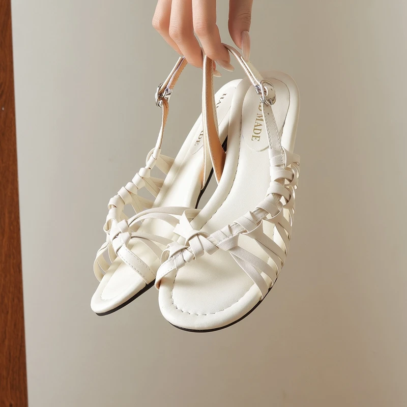 Women's new summer leather, cowhide, loose grip, comfortable low heel, woven open toe, woven Roman shoes, fashion sandals