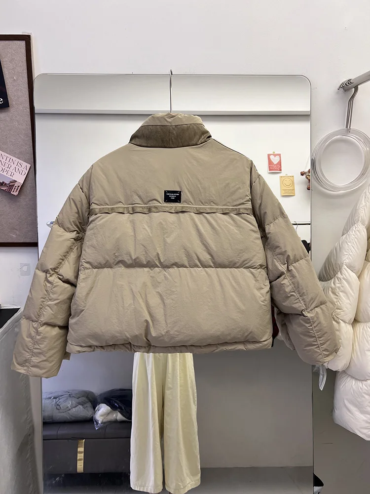 Moda de inverno nova jaqueta feminina commuter emenda gola versátil pato branco para baixo estilo curto jaqueta