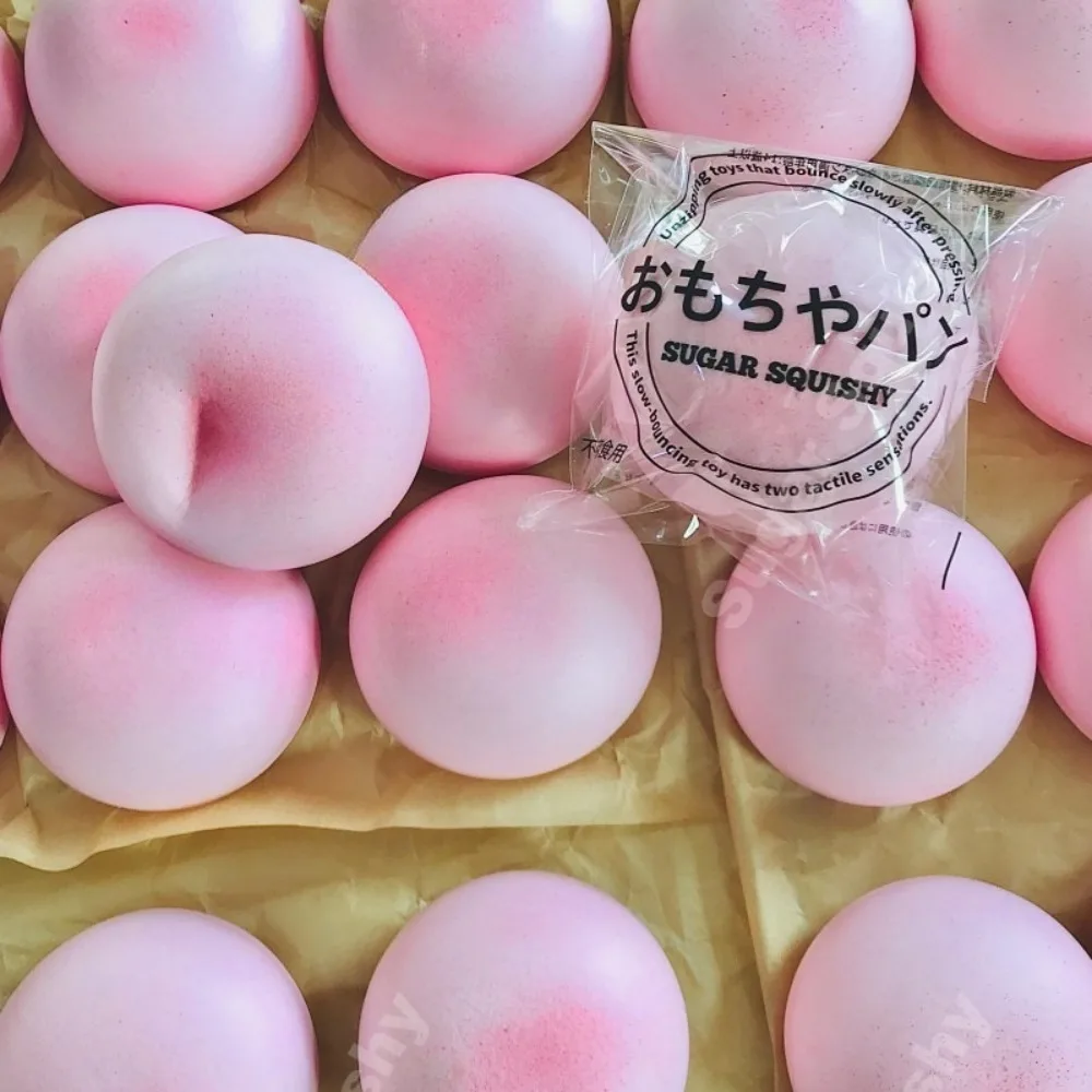 Simulation of pink buns squeezing toys sticky soft decompression slowly rising feeling anxious ADHD autistic children gifts.