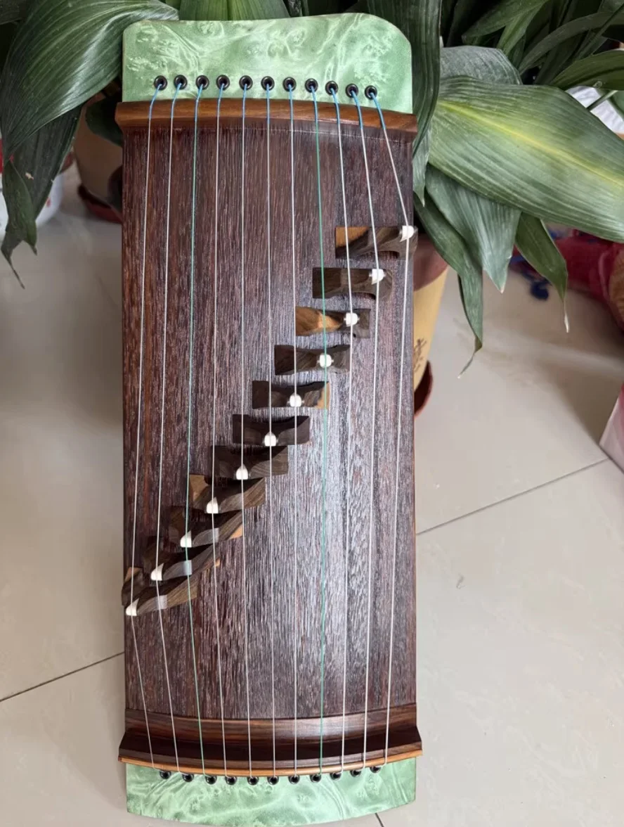 

Small Guzheng 11 strings 50cm portable string instrument