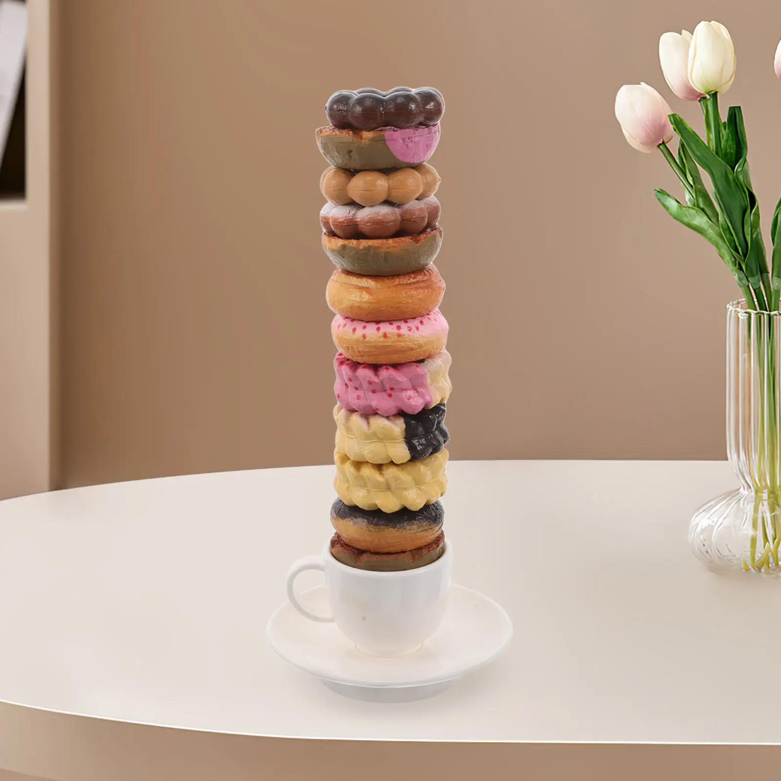 1セットの、カラフルで積み重ね可能な、お菓子の層を模したおもちゃ。子供向けの集中力トレーニングやバランスゲームに最適。
