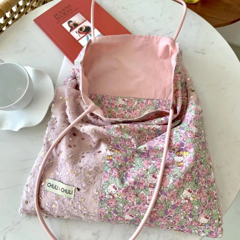 Bolso de lona Kawaii Sanrio Hello Kitty con diseño de nicho de lentejuelas rosa claro, bolso de lona de un solo hombro de alta gama, bolso de viaje para mujer