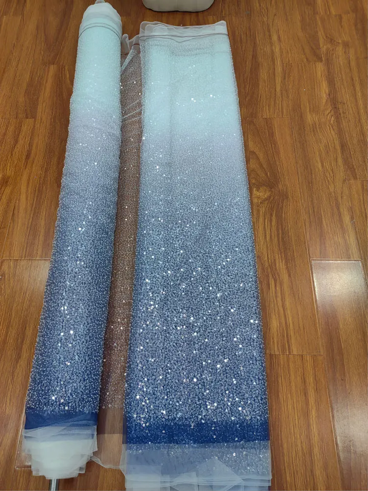 Light Blue See Through Mesh Fabric with Gradient Blue and Sequins Accents Is Used for Customized Wedding Dresses and Other Items