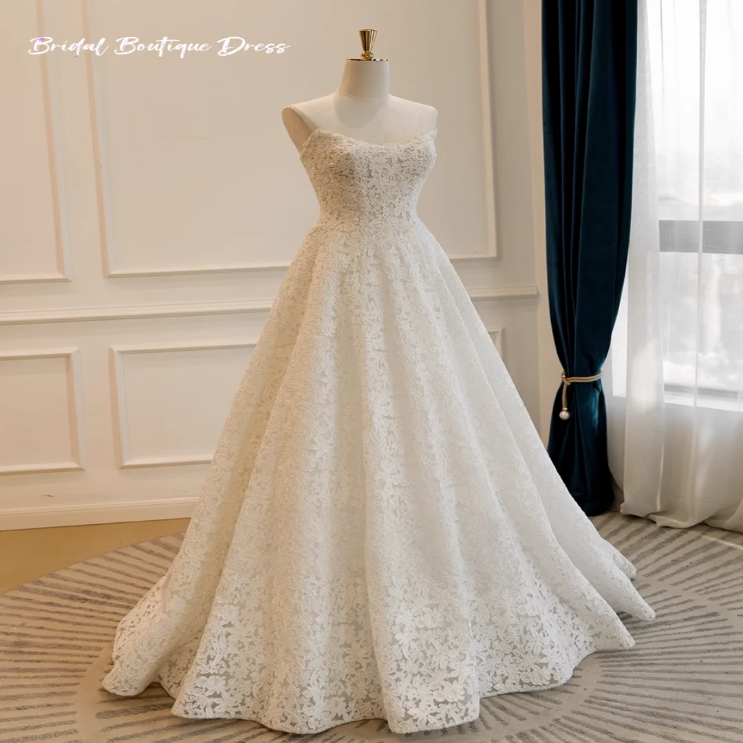 Maßgeschneidertes elegantes ärmelloses A-Linie-Hochzeitskleid mit Applikation, trägerlos, Sweep-Zug, Prinzessin-Brautkleid, Vestido De Novia