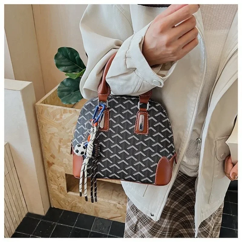 

Высококачественная нишевая сумка-ракушка для женщин, новая модная сумка 2023 года, универсальная сумка через плечо на одно плечо, сумка-подушка