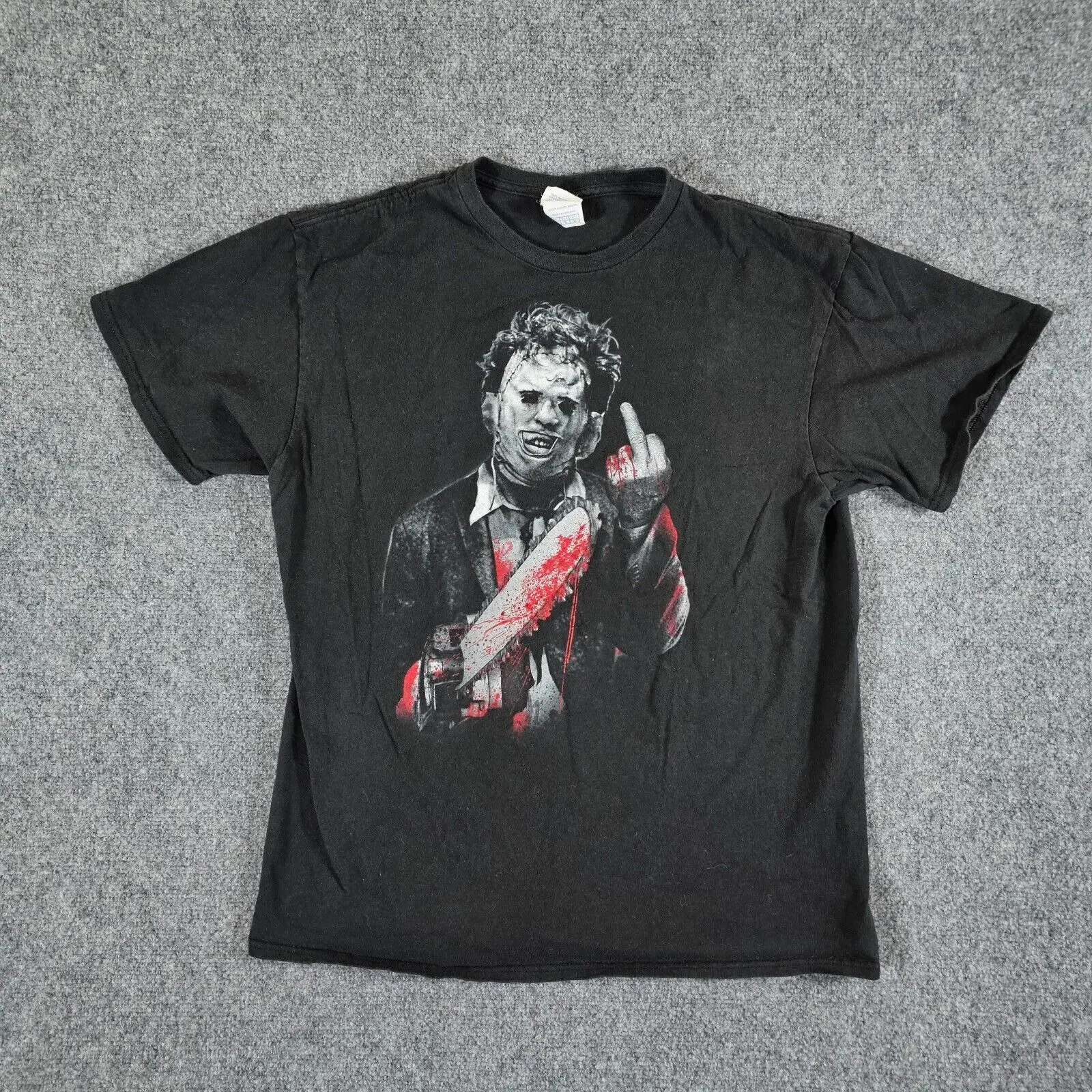 

Y2K Texas Chainsaw Leather Face Middle Finger Graphic T Shirt Black Men's Size L