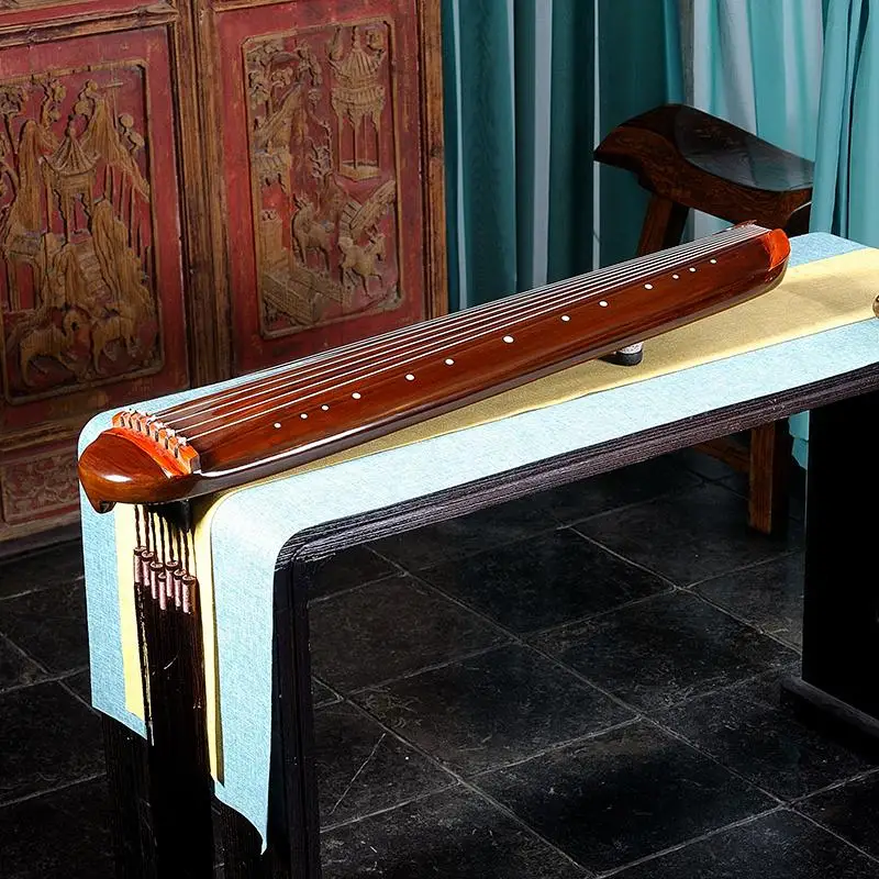 

Chinese Traditional Exquisite Handmade Candlenut Small Guqin Beginner Practice Portable Guqin Seven-Stringed Plucked Instrument