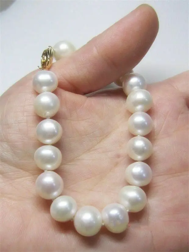 

HUGE AAA natural 10-11mm south sea pearl bracelet 7.5- 8"'14k Gold clasp