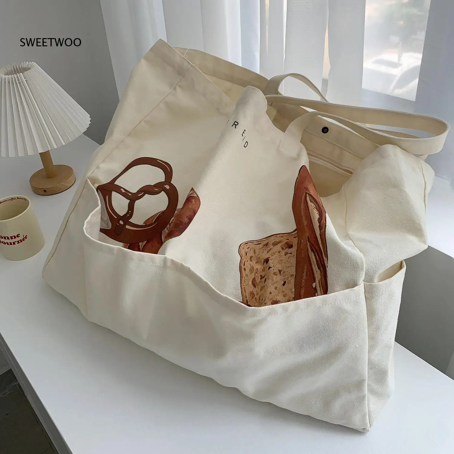 Large Canvas Tote Bag with Bread Print Design and Side Pocket Spacious Casual Shoulder Bag for Daily Use Work and Shopping 2026