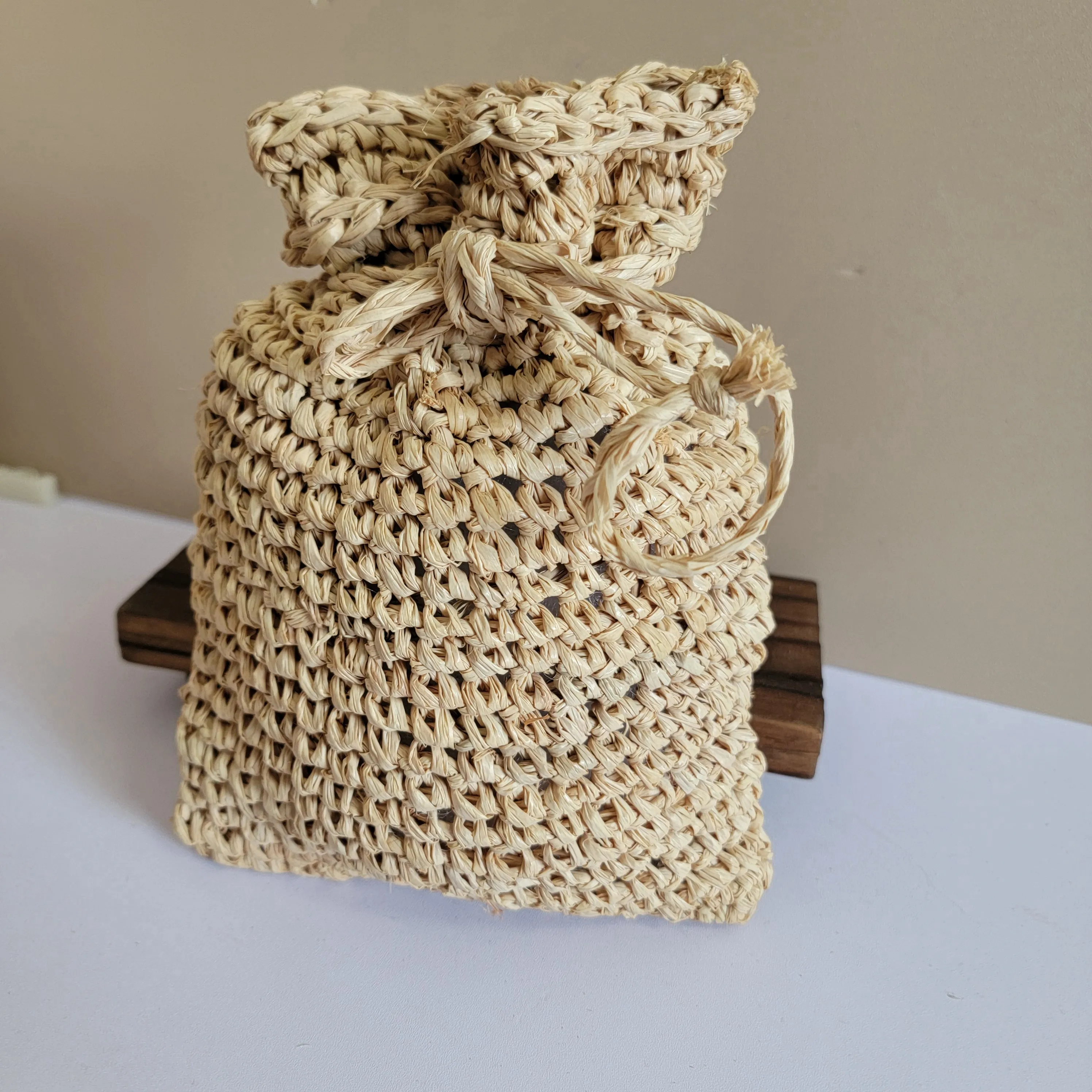 Picture 6: RAFFIA storage bag- drawstring bag