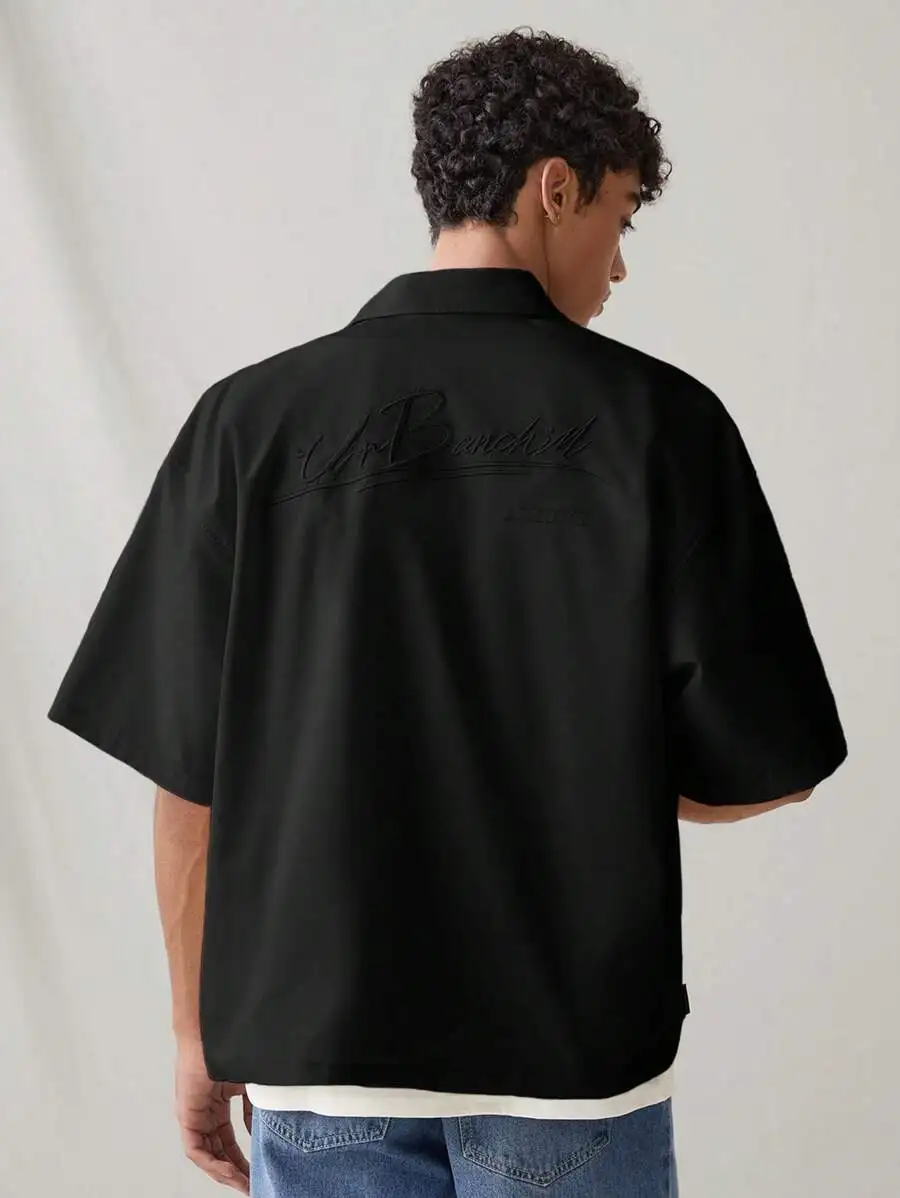 

Black Loose-Fit Casual Short Sleeve Shirt with Embossed Back Script Design