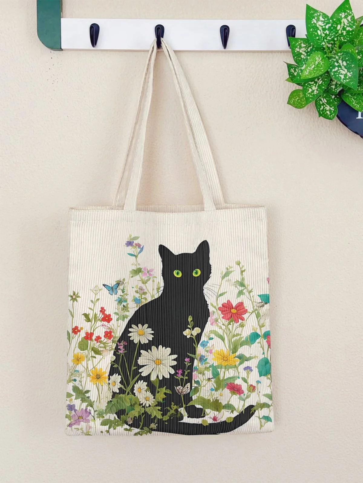 

Corduroy floral black cat print tote bag, ideal for cat lovers, perfect for daily commute and weekend getaways