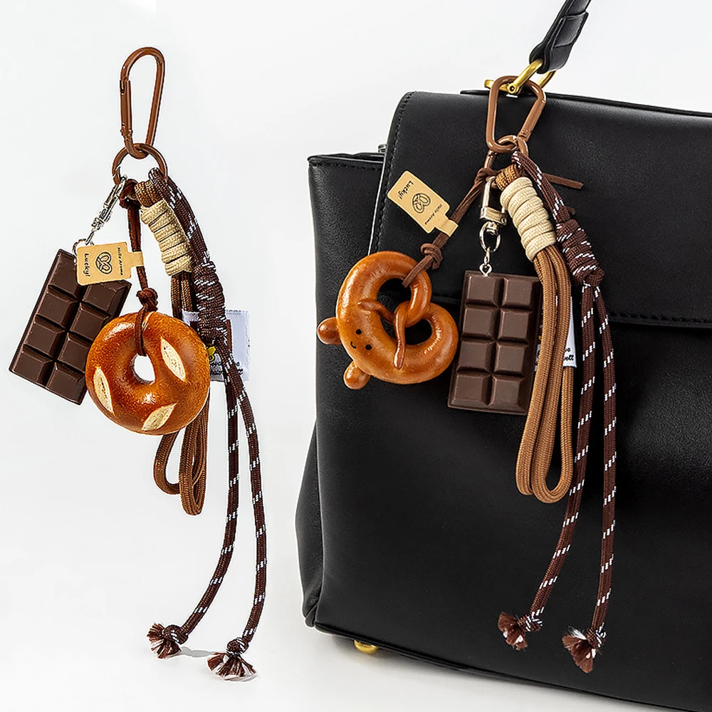 Llavero de moda con borla de cuerda trenzada y colgante de croissant y pretzel, tipo pulsera, para bolsos, carteras, llaves de coche, adorno, regalo para niñas