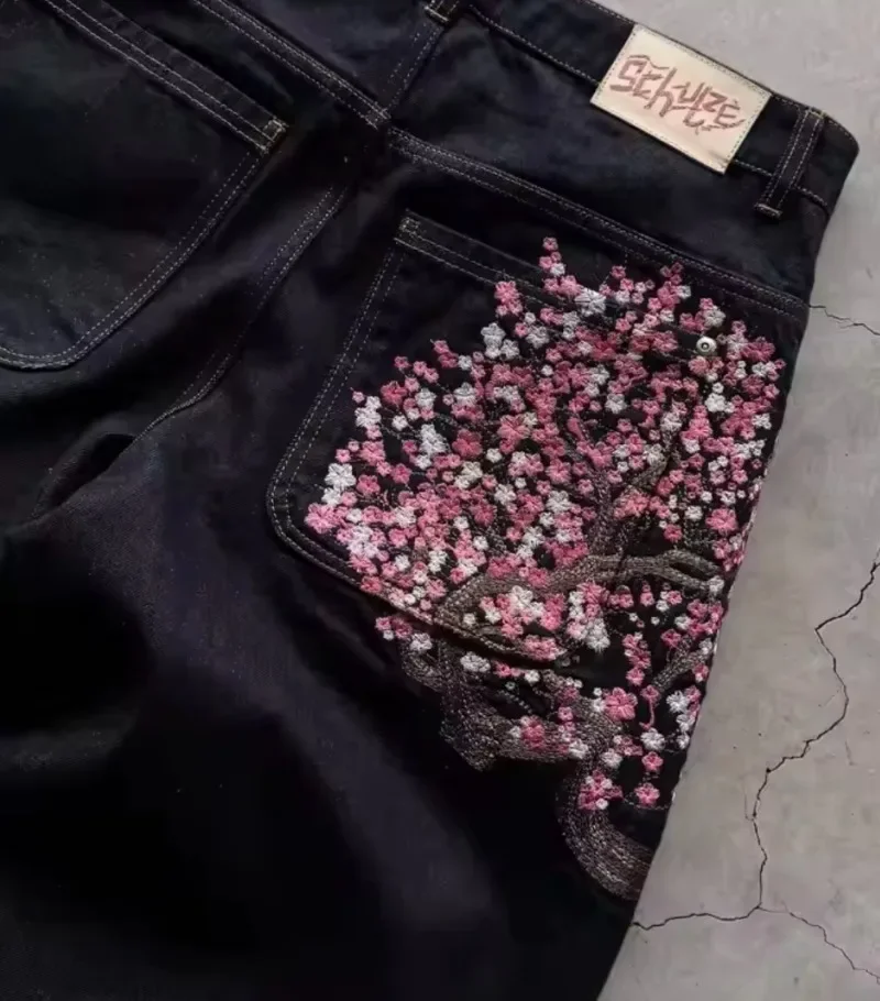 هاي ستريت الموضة العصرية Harajuku الهيب هوب روك المتضخم الجينز الرجال الأمريكية عالية الخصر غسل فضفاض ساكورا طباعة واسعة الساقين النساء