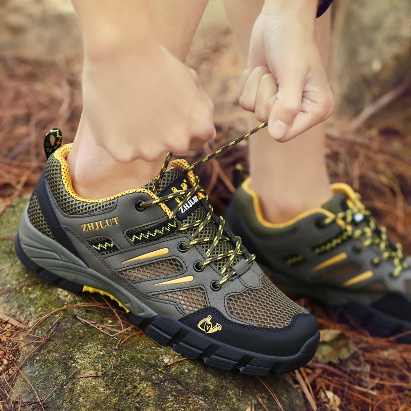 รองเท้าเดินป่าผู้ชายกันลื่นสบายรองเท้ากีฬากลางแจ้งแบบไม่มีส้นผู้ชายแบบผูกเชือกทนต่อการสึกหรอนุ่มระบายอากาศรองเท้าลำลองผู้ชาย
