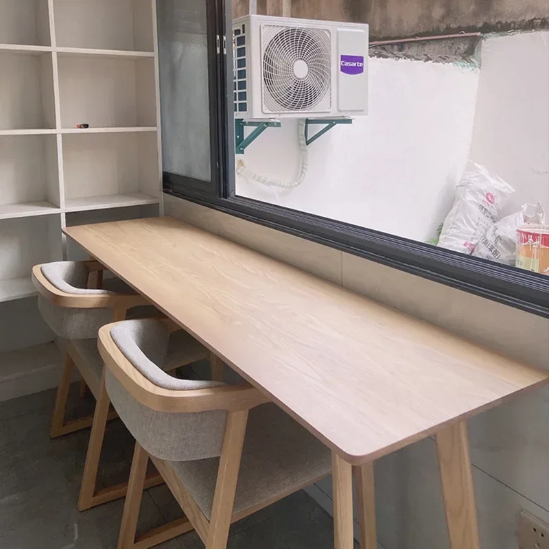 

Modern simple small apartment windowside desk home long solid wood bar table against the wall to write and study narrow computer