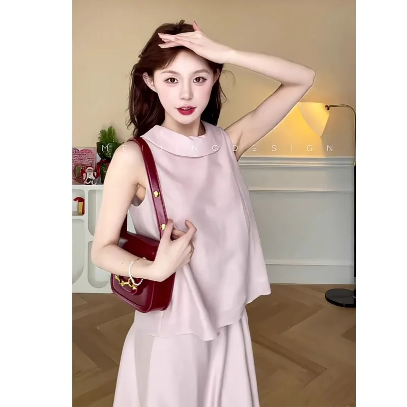 Nuevo conjunto de dos piezas de moda coreana de verano para mujer, cuello redondo, sin mangas, Color sólido, elegante chaleco sin mangas, Top + traje de falda de cintura alta