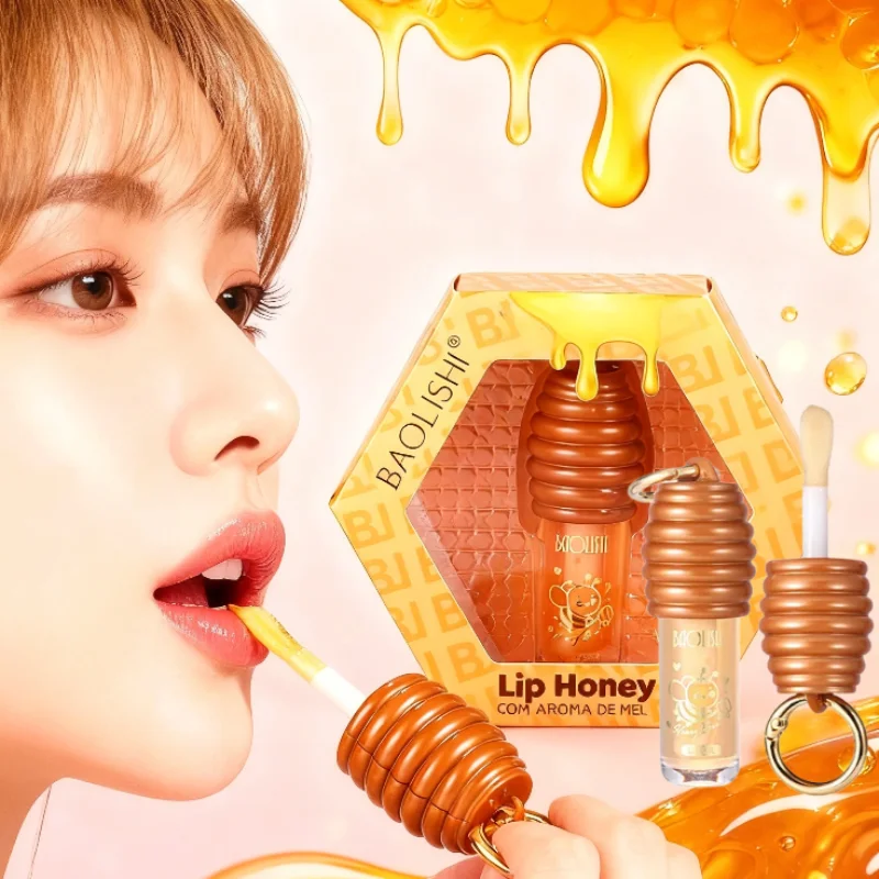 ลิปกลอสเนื้อฮันนี่ แบรนด์เอสเซนส์ ลิปบาล์ม บำรุงริมฝีปากให้ชุ่มชื้นยาวนาน ลดเลือนริ้วรอยริมฝีปาก พกพาสะดวก พร้อมพวงกุญแจ ลิปกลอสใส บำรุงริมฝีปาก
