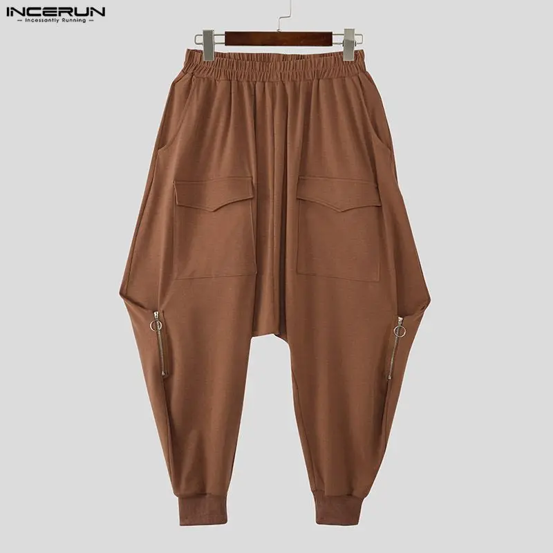

INCERUN Men Pants Solid Color Elastic Waist Joggers Loose Zipper Drop-crotch Pants Streetwear 2026 Pockets Casual Trousers Men