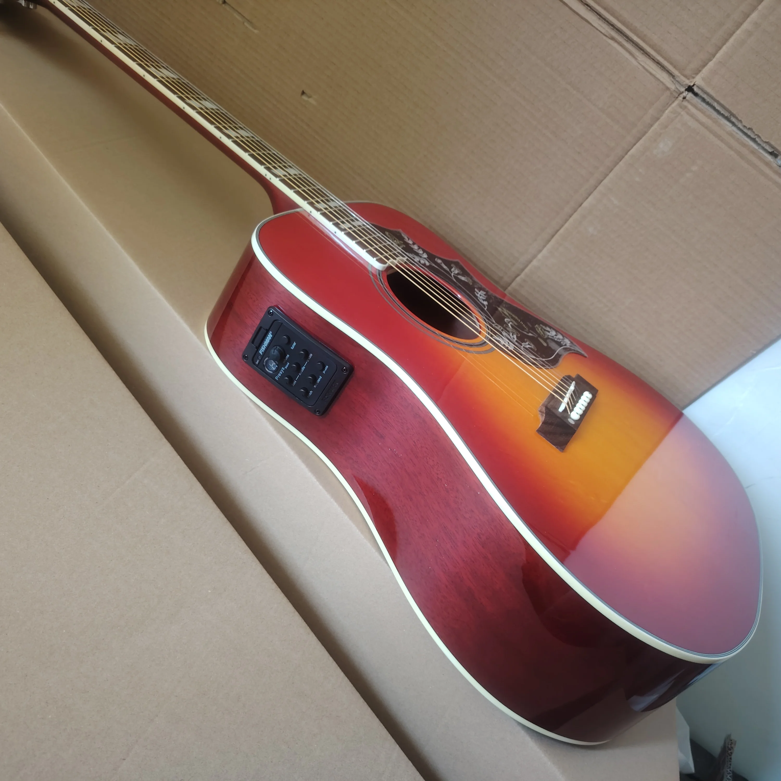 

41 inch, 6-string acoustic guitar, redwood fingerboard, spruce top,