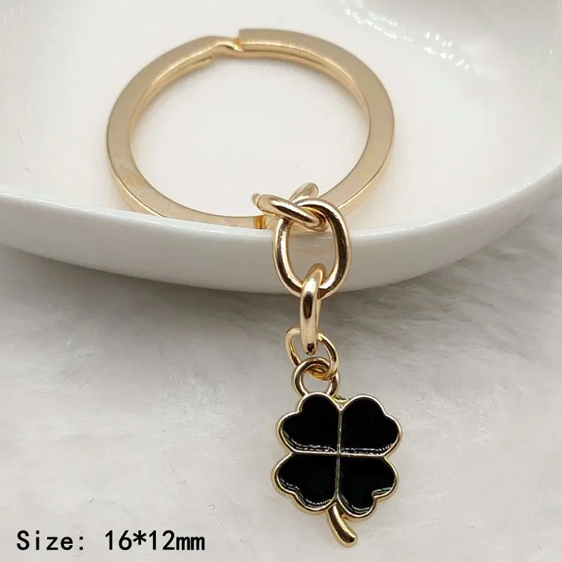 Creative multi-color enamel Four-leaf clover lucky key chain pendant bag accessories girl key chain Christmas gift sales