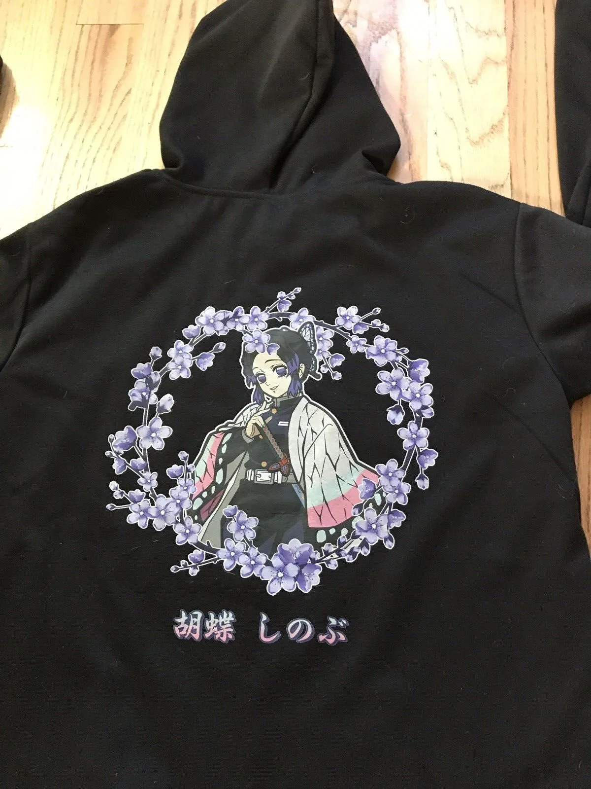 

Anime mens black w anime print long sleeve hoodie size 2XL