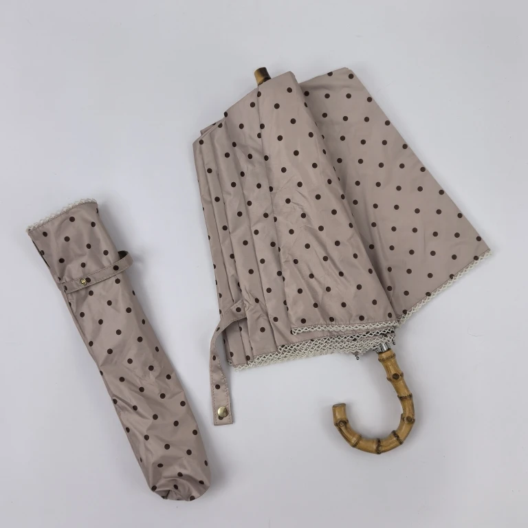 

Women's Lightweight Bamboo Stem Umbrella Wave Dot Pattern Bla Glue Foldable Four Seasons Use Sunny Rain Two Fold Umbrella