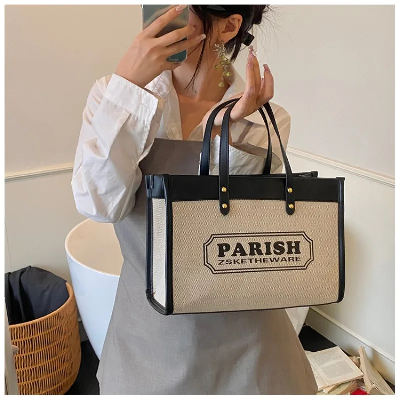 

High-End Minimalist Tote Bag For Business Women Featuring Trendy Solid Color Leather And Paris Fashion