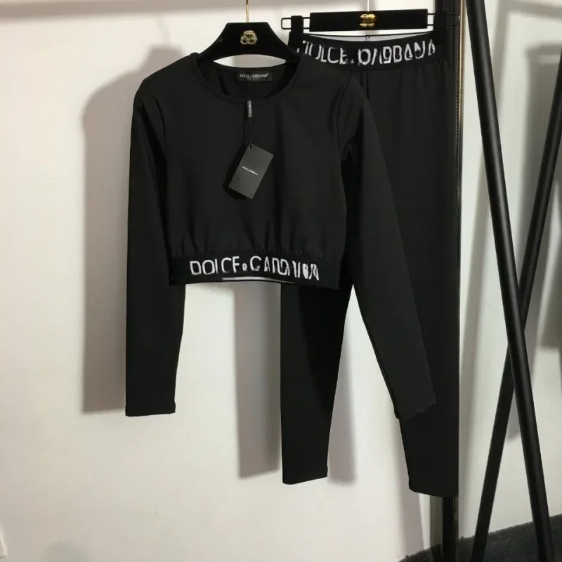 Nuevo conjunto deportivo de Yoga con cinturón tejido de letras, camiseta de manga larga con cuello redondo, mallas elásticas adelgazantes, Fitness de algodón orgánico para mujer Ou