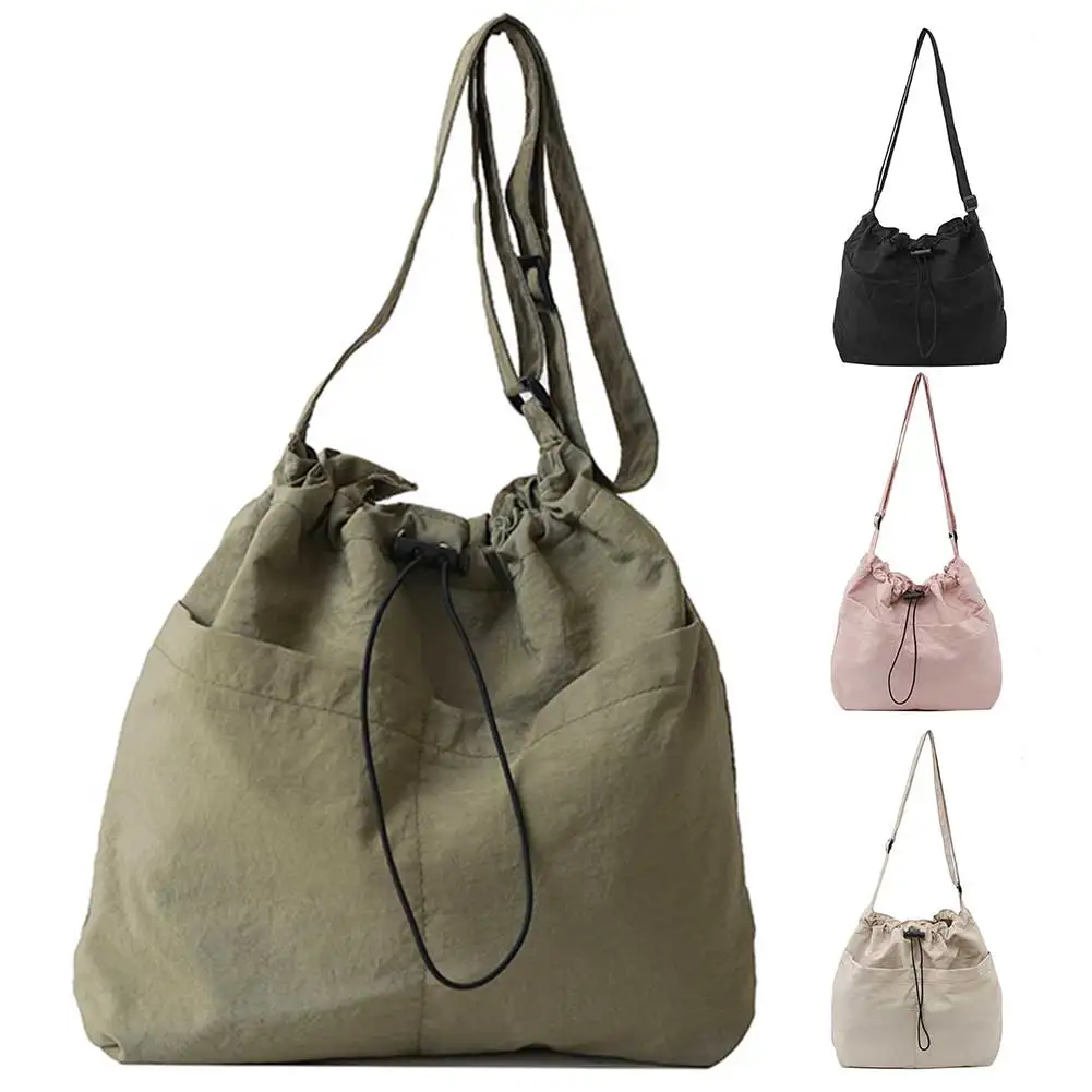 

Women Stylish Crossbody Bag Large Capacity Nylon Drawstring Bucket Bag Simple Messenger Bag Adjustable Strap for Work Vacation