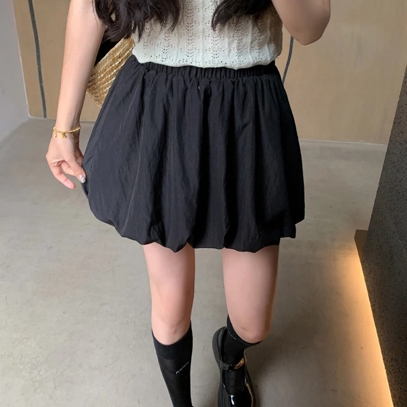 เกาหลีเก๋จีบพัฟกระโปรงมินิกระโปรงผู้หญิง 2025 ฤดูร้อนเอวสูงดอกไม้ Bud กระโปรงสั้นผู้หญิงสีทึบทั้งหมดเค้กกระโปรง