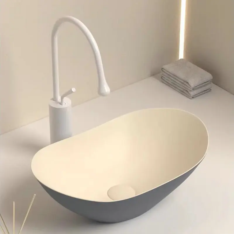 

Cream style artistic countertop basin, washbasin single basin, ceramic oval shaped bathroom balcony basin BB094TY